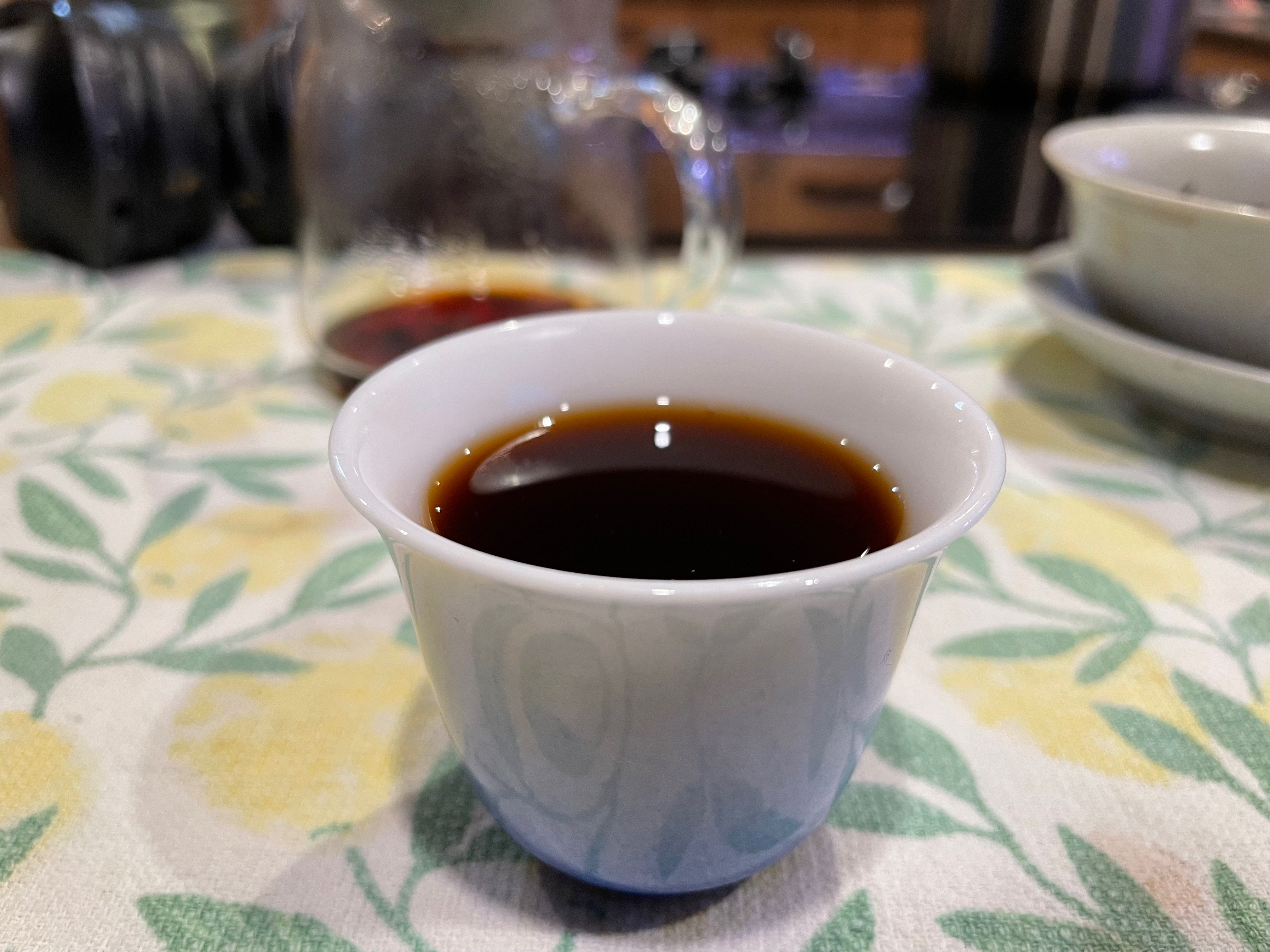 A photo of a a cup of Kuura Cola.